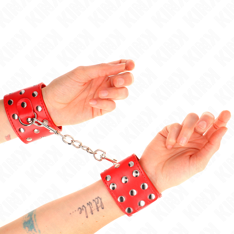 KINK - WRIST RESTRAINTS WITH SNAP FASTEN FULL OF RIVETS RED ADJUSTABLE 19-24 CM X 5.5 CM