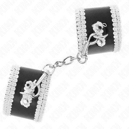 KINK - SUJETADORES DE MUÑECAS NEGROS CON ENCAJE DECORADO BLANCO AJUSTABLES 20-23 CM X 5,5 CM